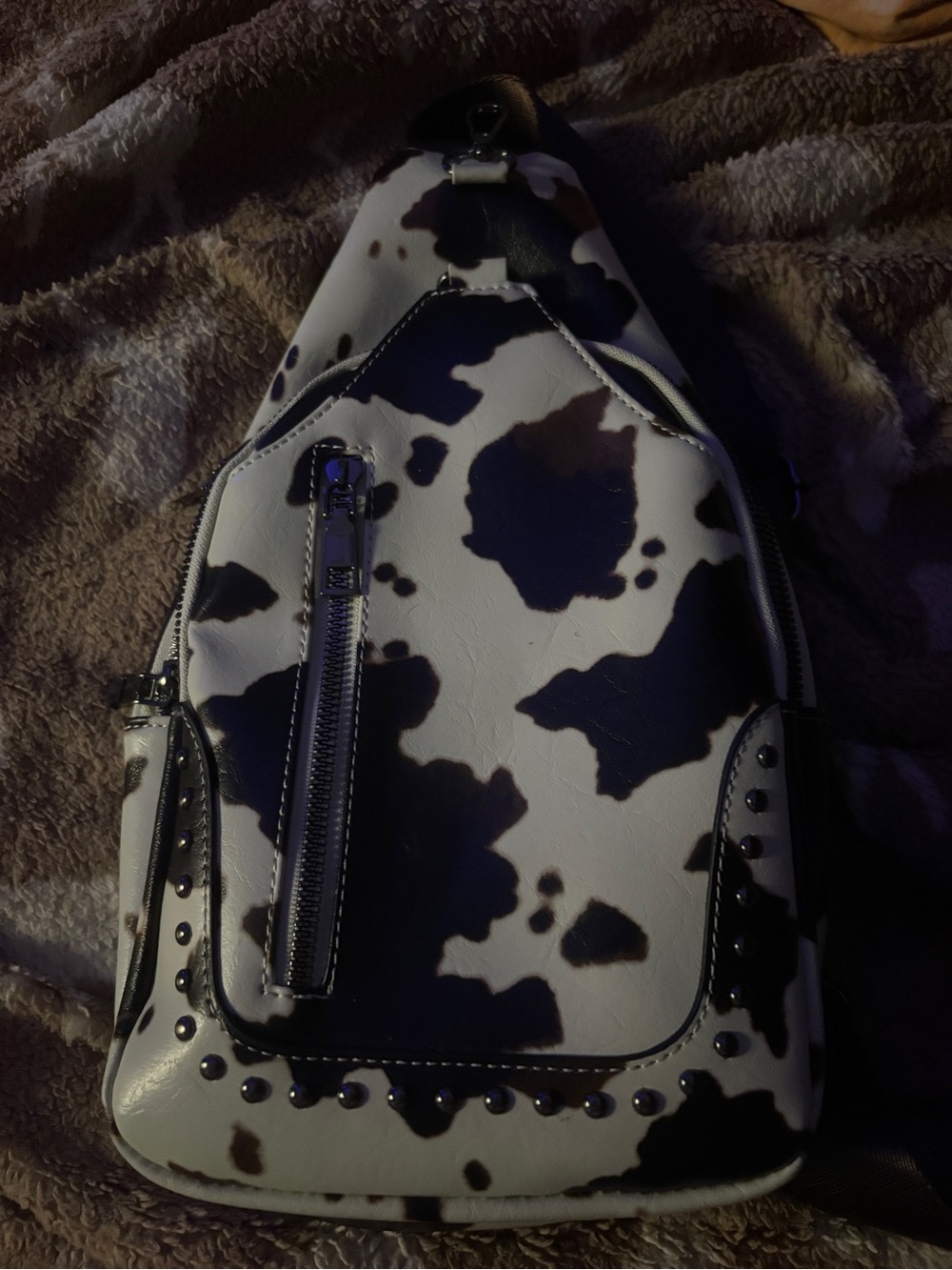 Cow Print Studded Sling Backpack - Black & White